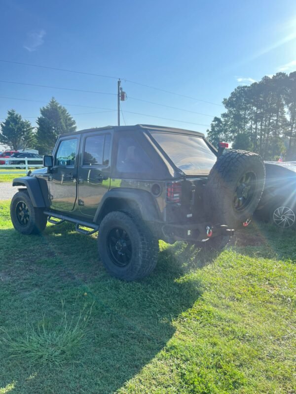 45 ATRAS LADO CONDUCTOR 2015 Jeep Wrangler Rubicon 76.000 millas