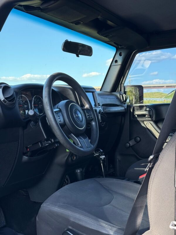 2016 Jeep Wrangler Unlimited Sport | 76 millas