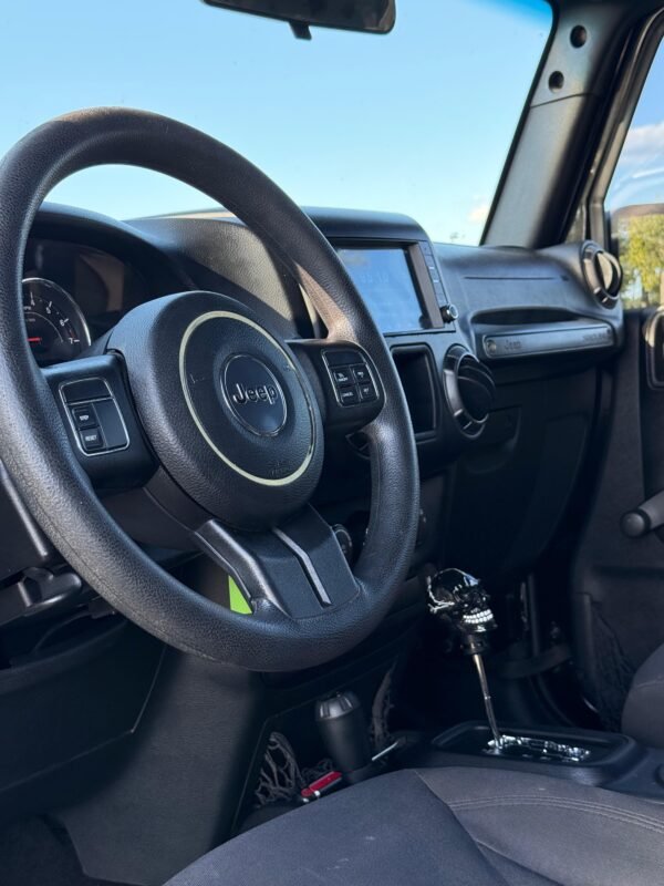 2016 Jeep Wrangler Unlimited Sport | 76 millas